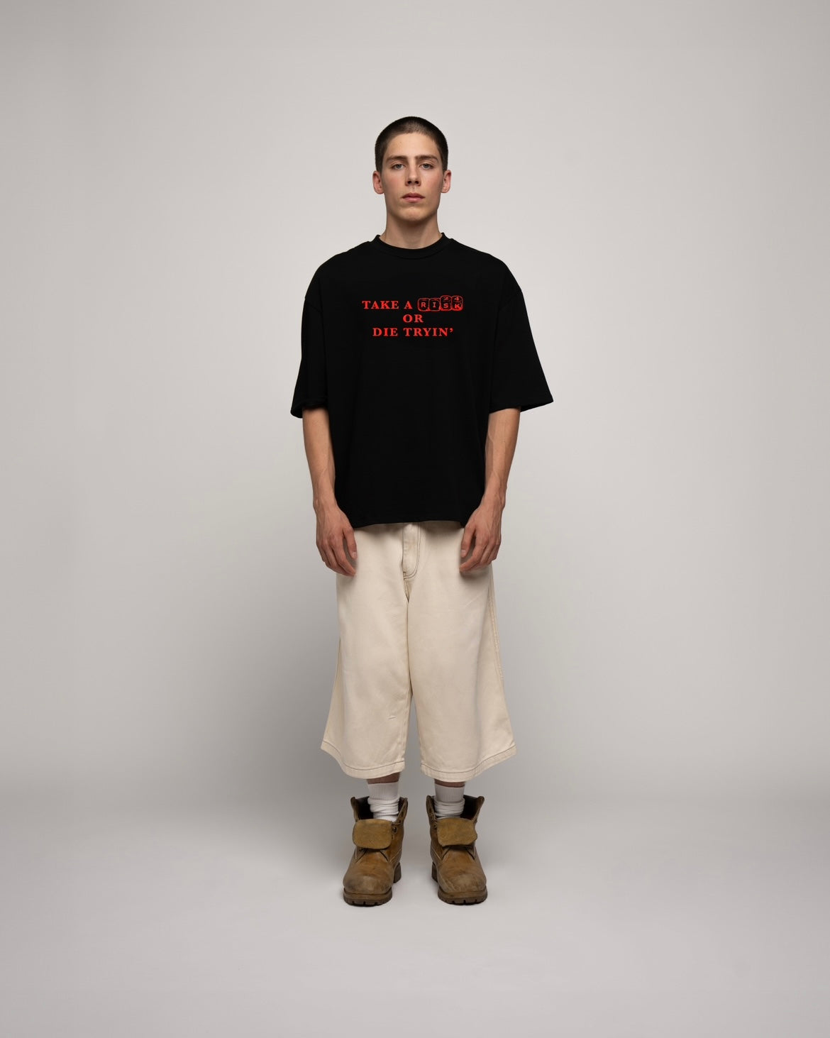 TAKE A RISK BLACK TEE